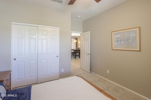 4975 W Gulch Dr, Eloy, AZ 85131 - bedroom featuring light carpet, visible vents, a closet, and baseboards