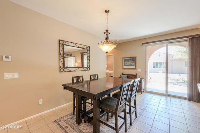 4975 W Gulch Dr, Eloy, AZ 85131 - dining space featuring light tile patterned floors and baseboards