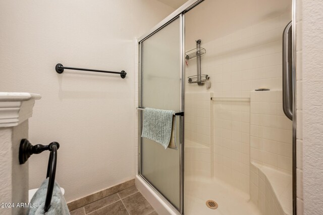 14950 W Mountain View Blvd Unit 1305, Surprise, AZ 85374 - bathroom featuring a shower stall and tile patterned floors