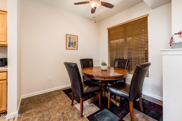 14950 W Mountain View Blvd Unit 1305, Surprise, AZ 85374 - dining area featuring ceiling fan, baseboards, and stone finish flooring