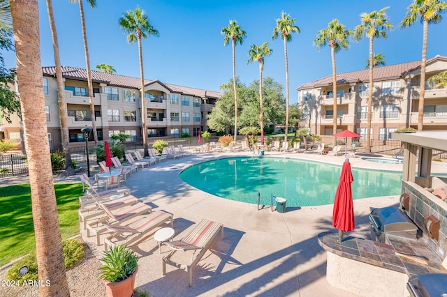 view of swimming pool featuring a patio