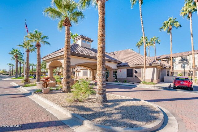 14950 W Mountain View Blvd Unit 1305, Surprise, AZ 85374 - mediterranean / spanish house featuring stucco siding and a tiled roof