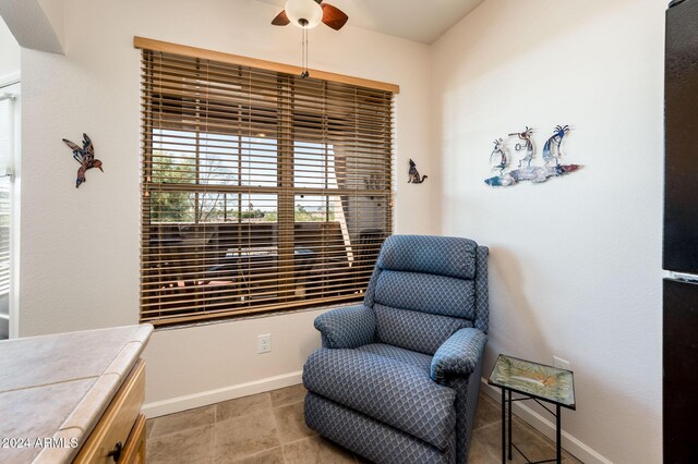 14950 W Mountain View Blvd Unit 1305, Surprise, AZ 85374 - sitting room featuring ceiling fan and baseboards