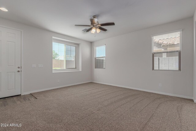 812 E Agua Fria Ln, Avondale, AZ 85323 - unfurnished room featuring baseboards, ceiling fan, and carpet