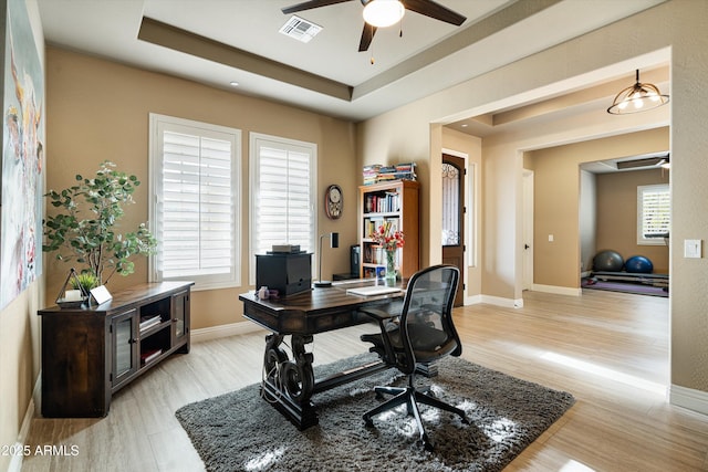 35971 N Prickley Pear Rd, Cave Creek, AZ 85331 - office space featuring ceiling fan, light wood-style floors, a raised ceiling, and baseboards