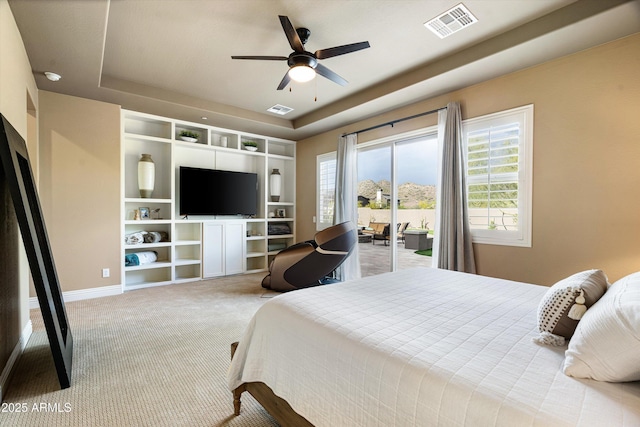 35971 N Prickley Pear Rd, Cave Creek, AZ 85331 - bedroom with a raised ceiling, multiple windows, carpet flooring, and access to outside