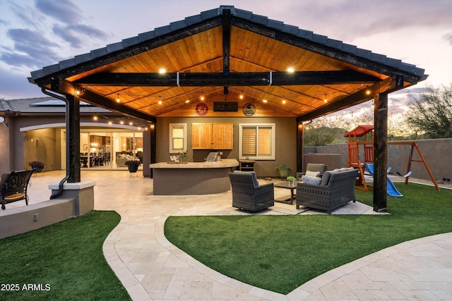 35971 N Prickley Pear Rd, Cave Creek, AZ 85331 - view of patio / terrace featuring an outdoor hangout area, exterior bar, a playground, and area for grilling