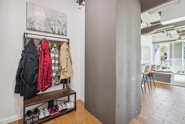 mudroom with hardwood / wood-style flooring