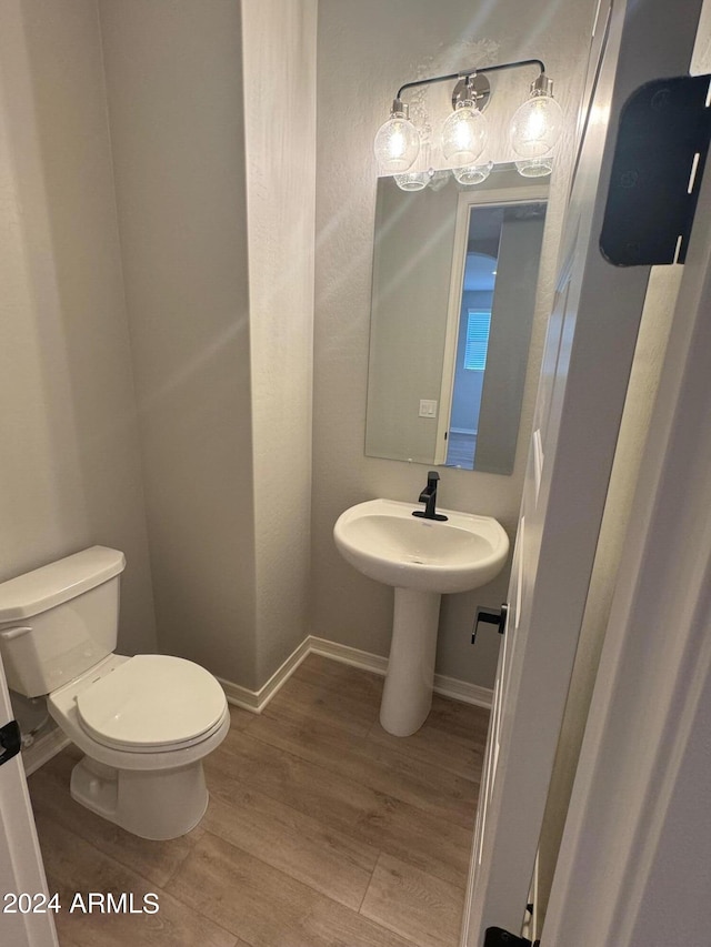 3375 W Verde River Rd, San Tan Valley, AZ 85144 - bathroom featuring toilet and wood finished floors