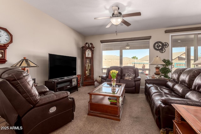 carpeted living room featuring ceiling fan