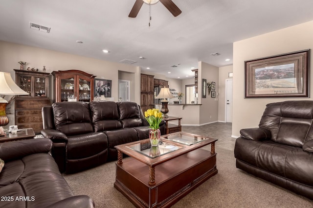 living room with visible vents, recessed lighting, baseboards, and ceiling fan