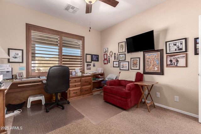 home office featuring baseboards, visible vents, and ceiling fan