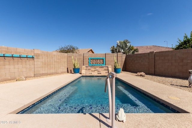 view of swimming pool featuring a fenced in pool and a fenced backyard