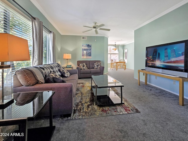 carpeted living room with crown molding, a ceiling fan, baseboards, and visible vents