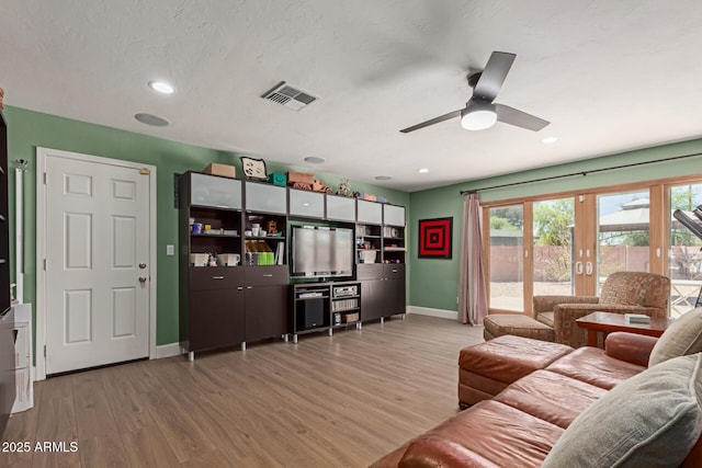 6532 E Aster Dr, Scottsdale, AZ 85254 - living room with baseboards, light wood-style floors, a ceiling fan, and recessed lighting