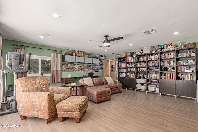 6532 E Aster Dr, Scottsdale, AZ 85254 - sitting room with a ceiling fan, wood finished floors, and recessed lighting