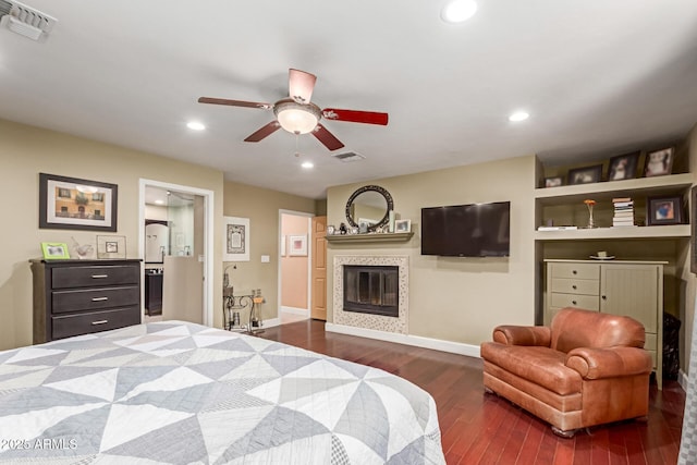 6532 E Aster Dr, Scottsdale, AZ 85254 - bedroom with dark wood-type flooring, a fireplace, baseboards, recessed lighting, and ceiling fan
