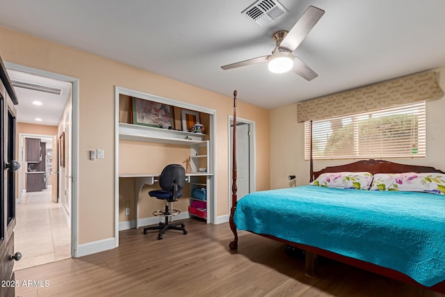 6532 E Aster Dr, Scottsdale, AZ 85254 - bedroom featuring wood finished floors, an office area, ceiling fan, baseboards, and recessed lighting