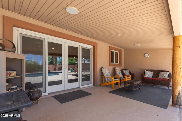 6532 E Aster Dr, Scottsdale, AZ 85254 - view of patio / terrace with french doors and outdoor lounge area