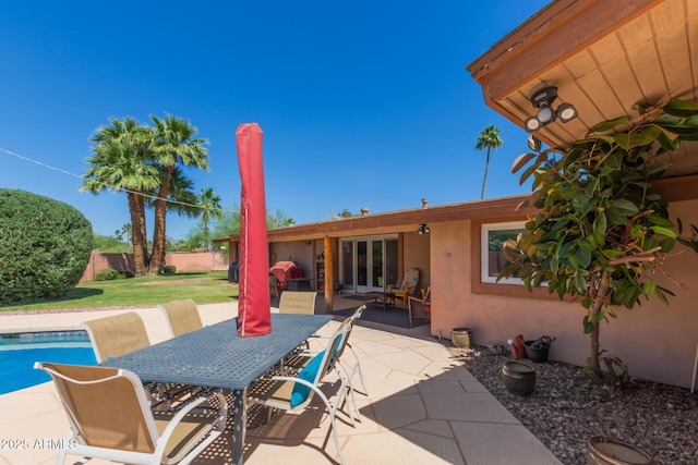 6532 E Aster Dr, Scottsdale, AZ 85254 - view of patio featuring outdoor dining space and french doors