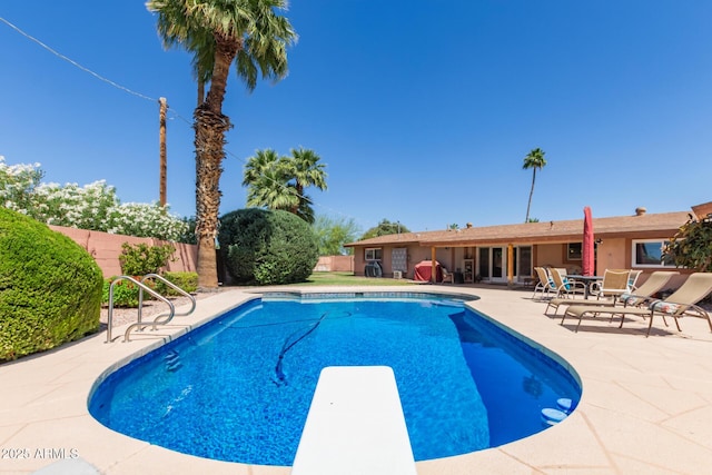 6532 E Aster Dr, Scottsdale, AZ 85254 - view of pool with a fenced backyard, a patio area, and a diving board