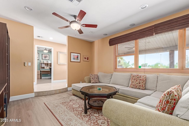6532 E Aster Dr, Scottsdale, AZ 85254 - living room with ceiling fan, baseboards, light wood-style floors, and recessed lighting