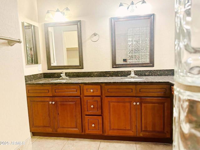 bathroom with vanity and tile patterned flooring