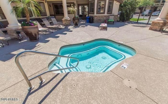 view of pool featuring a patio area