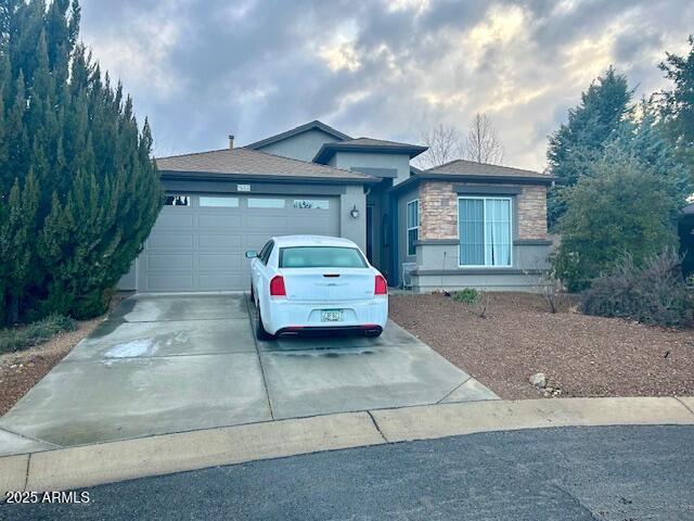 view of front of home with a garage