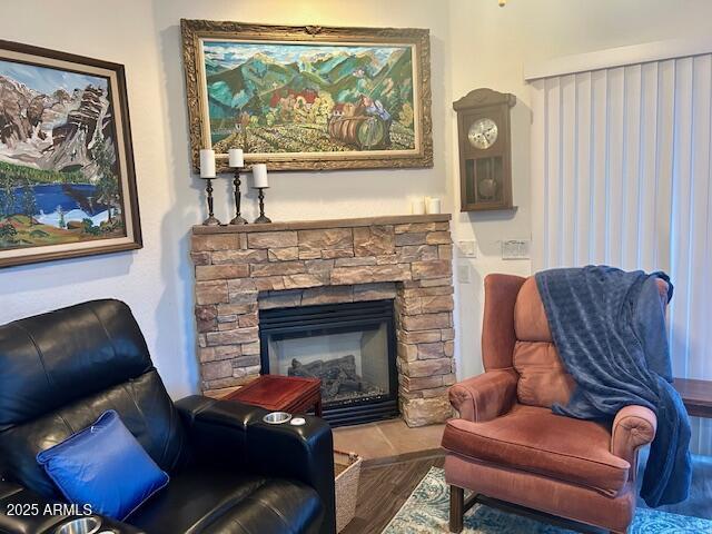 7604 E Sedalia Trl, Prescott Valley, AZ 86315 - living area featuring hardwood / wood-style floors and a fireplace