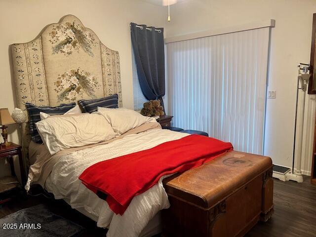 7604 E Sedalia Trl, Prescott Valley, AZ 86315 - bedroom with dark hardwood / wood-style floors