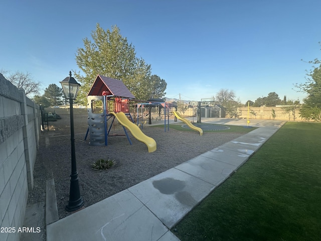 community jungle gym with fence