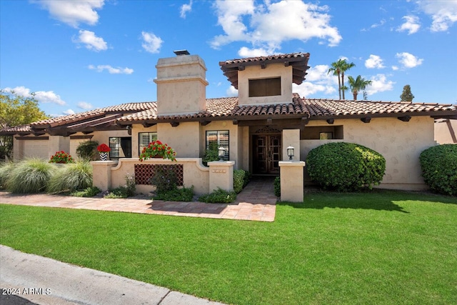 view of front of house featuring a front lawn