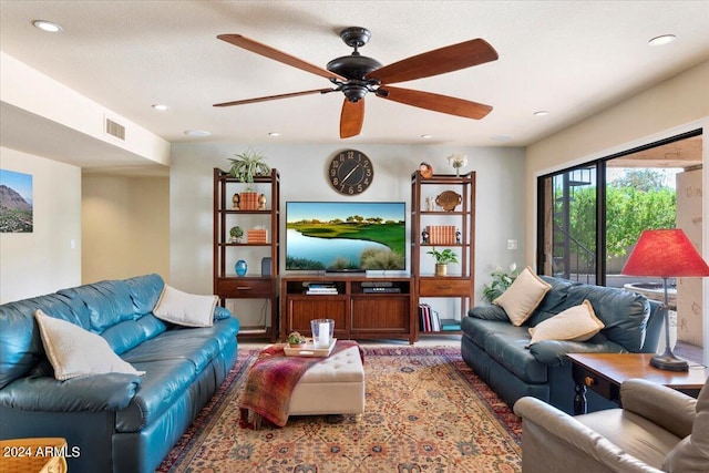 living room with ceiling fan