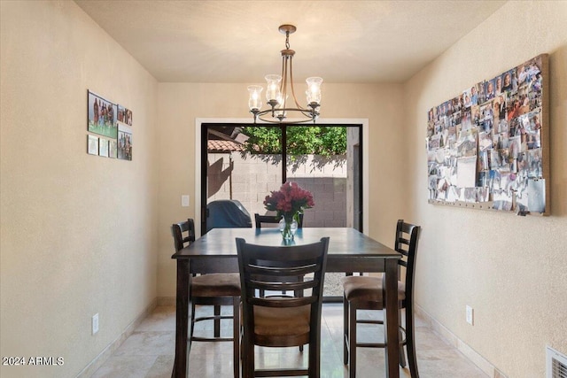 dining room featuring an inviting chandelier