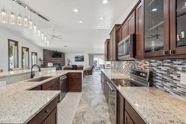 920 N 104th St, Mesa, AZ 85207 - kitchen with stainless steel appliances, a ceiling fan, plenty of natural light, and recessed lighting