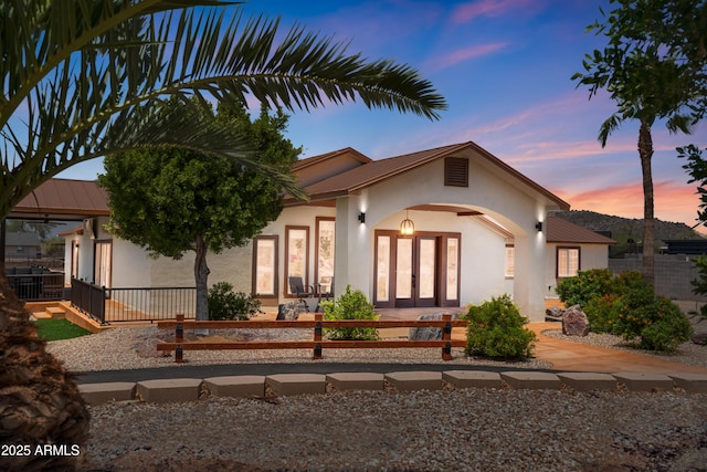 920 N 104th St, Mesa, AZ 85207 - view of front facade featuring stucco siding, metal roof, and a standing seam roof