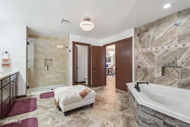 920 N 104th St, Mesa, AZ 85207 - bathroom featuring a garden tub, a stall shower, vanity, and toilet