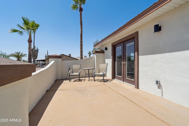 920 N 104th St, Mesa, AZ 85207 - view of patio featuring french doors and a balcony