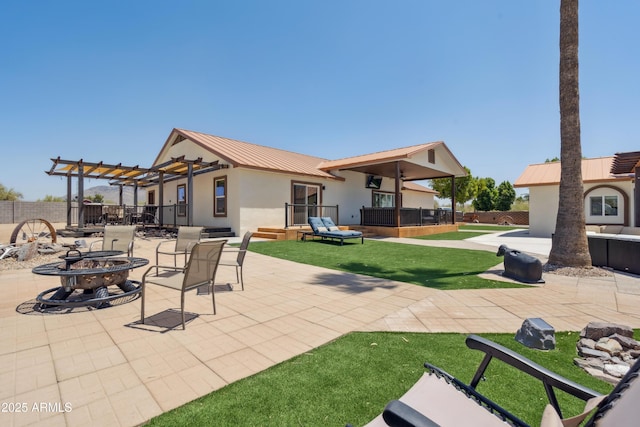 920 N 104th St, Mesa, AZ 85207 - view of patio / terrace with a fire pit and a pergola