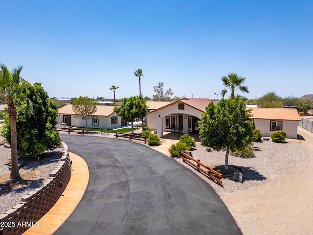 920 N 104th St, Mesa, AZ 85207 - view of front of property featuring stucco siding and metal roof