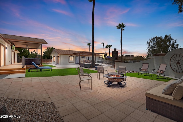 920 N 104th St, Mesa, AZ 85207 - view of patio with an outdoor living space with a fire pit