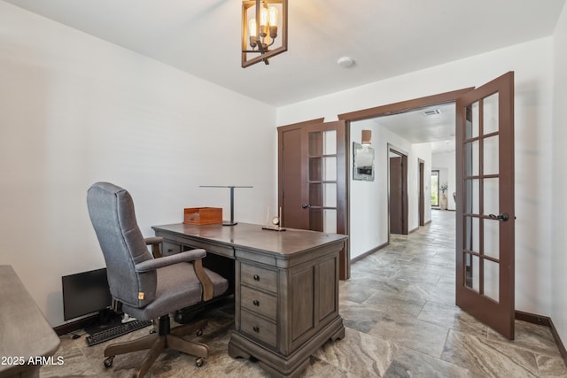 920 N 104th St, Mesa, AZ 85207 - office space featuring french doors, stone finish flooring, a chandelier, and baseboards
