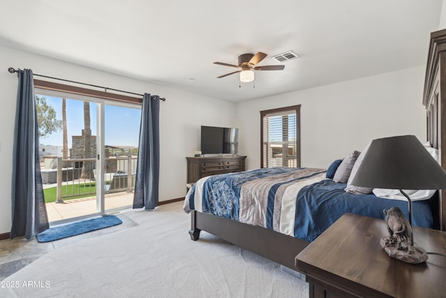 920 N 104th St, Mesa, AZ 85207 - bedroom featuring access to exterior, baseboards, light carpet, and a ceiling fan