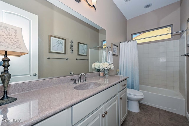 full bathroom featuring toilet, vanity, tile patterned floors, and shower / tub combo with curtain