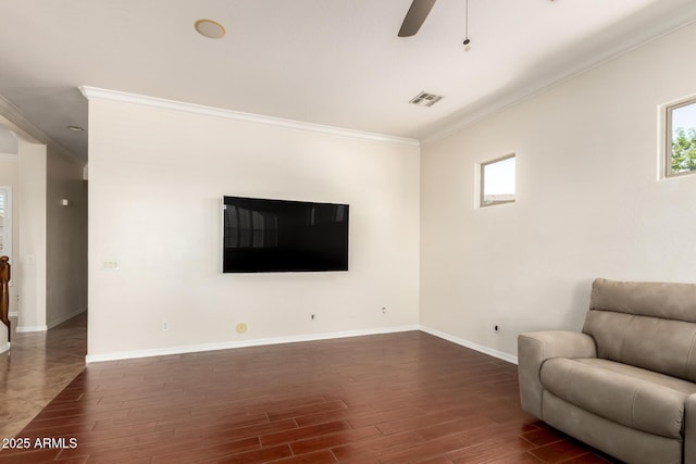 21605 S 187th Way, Queen Creek, AZ 85142 - unfurnished room featuring crown molding, ceiling fan, baseboards, plenty of natural light, and dark wood-style flooring