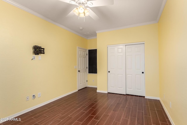 21605 S 187th Way, Queen Creek, AZ 85142 - unfurnished bedroom with dark wood-type flooring, baseboards, ornamental molding, a closet, and ceiling fan