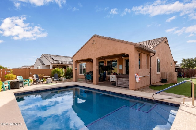 view of swimming pool featuring a patio