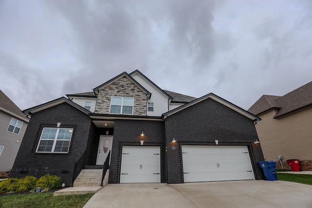 view of front facade featuring stone siding, crawl space, brick siding, and driveway