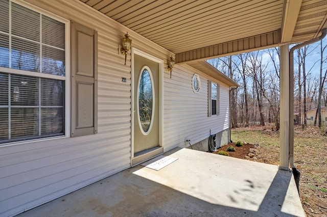 doorway to property with a patio